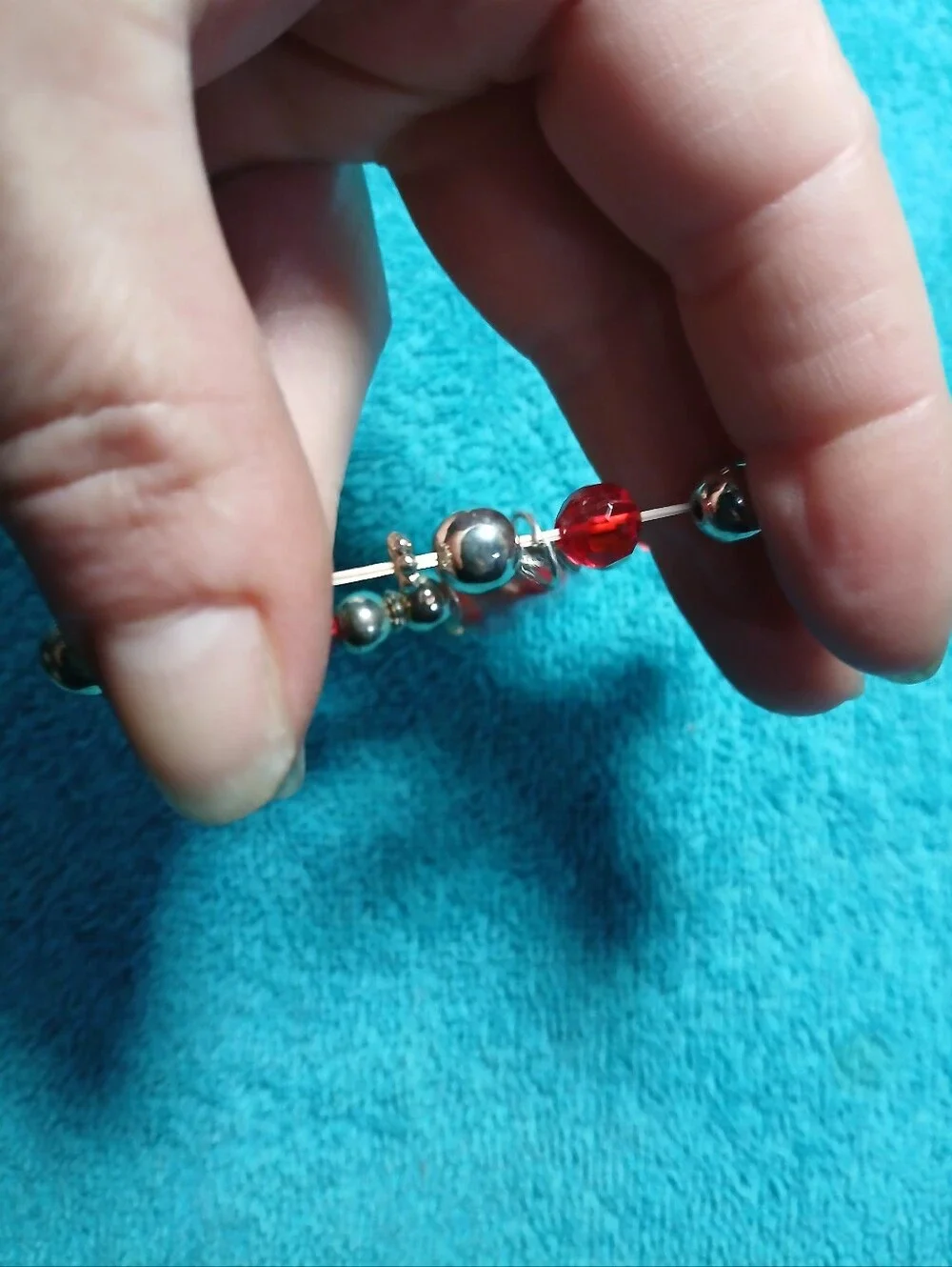 Red Stretch Beaded Bracelet With Red Hats And Silver Accent Beads